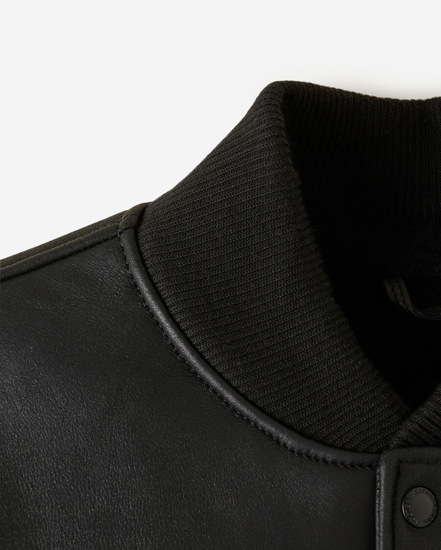 chaqueta universitaria de piel de oveja