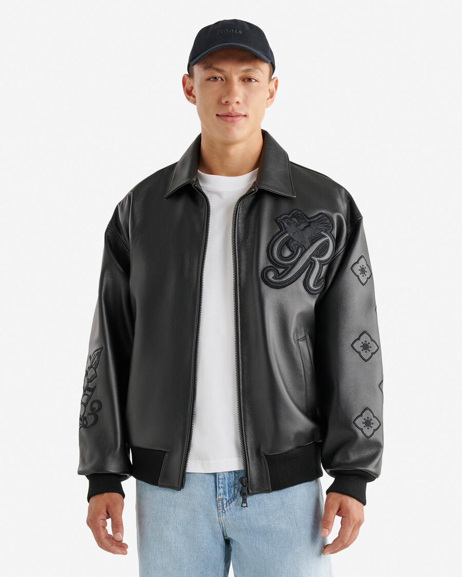 chaqueta universitaria roots signature