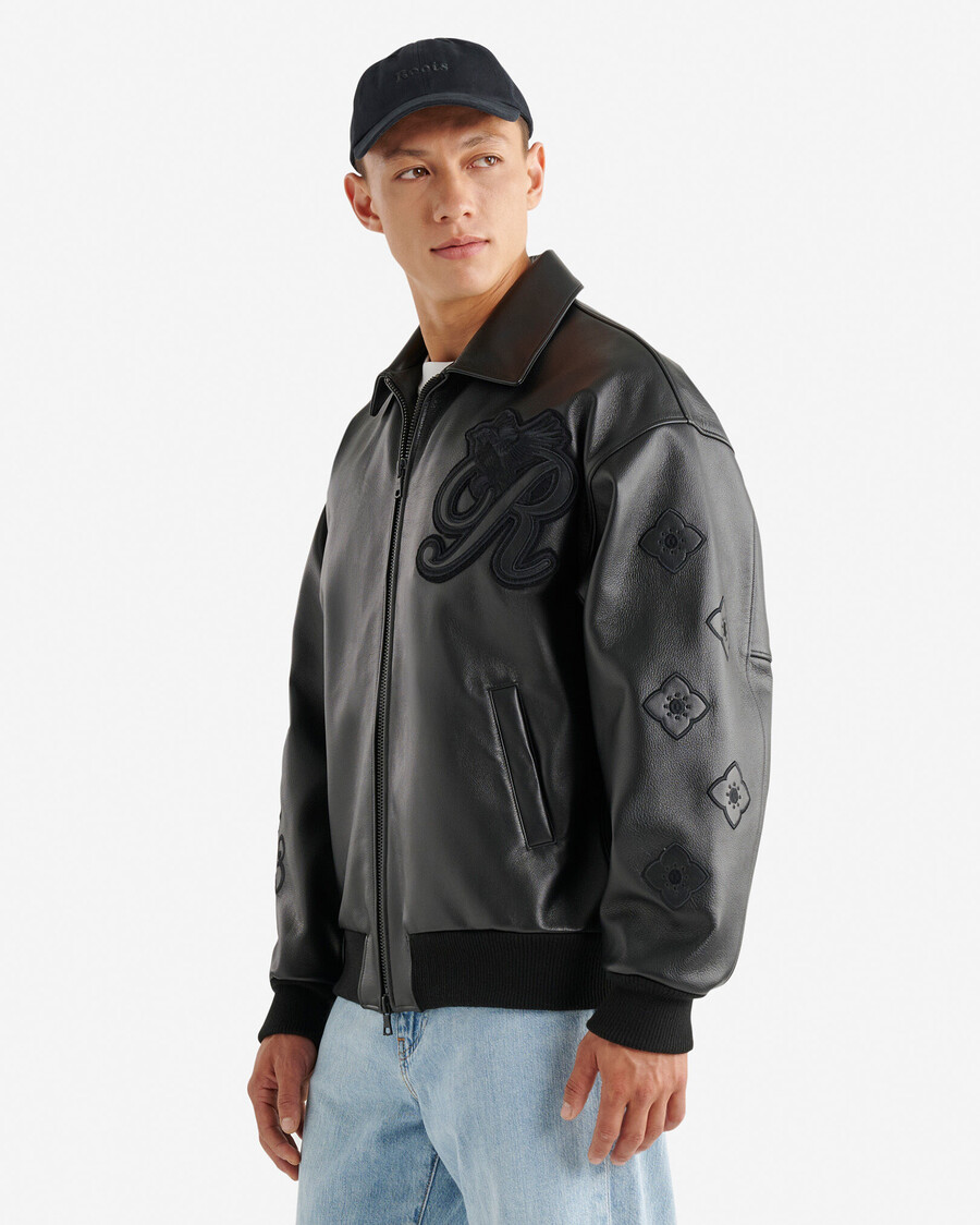 chaqueta universitaria roots signature