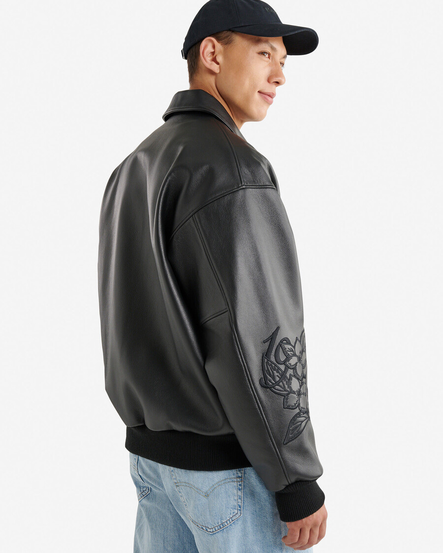 chaqueta universitaria roots signature