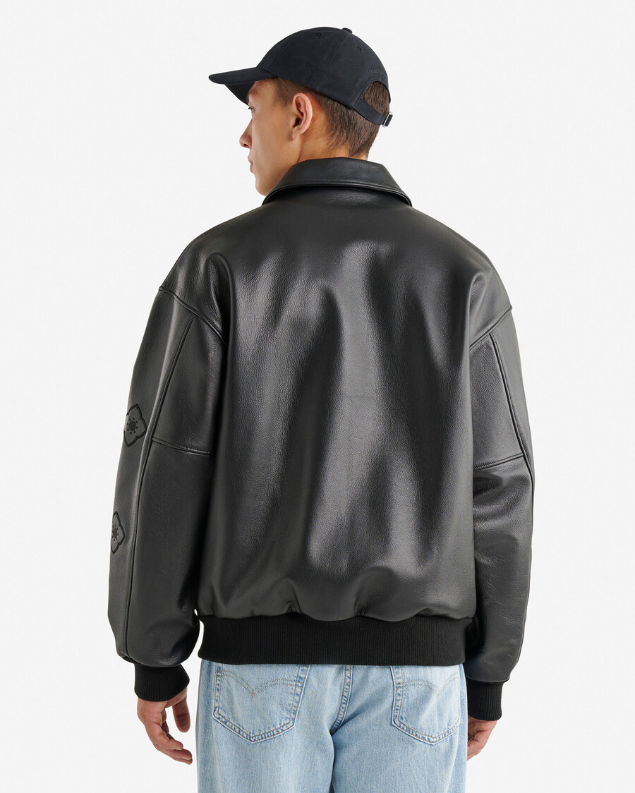 chaqueta universitaria roots signature