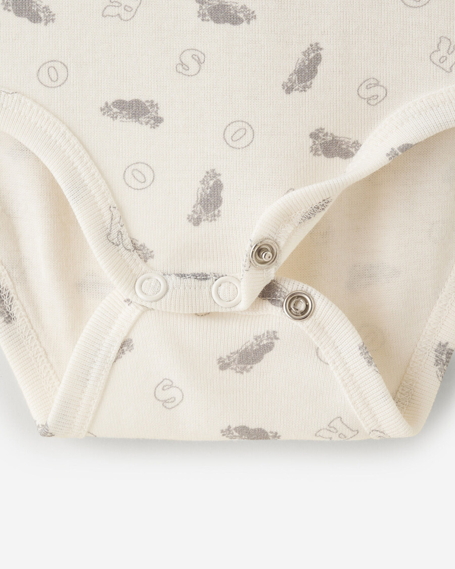 primer body para bebé roots