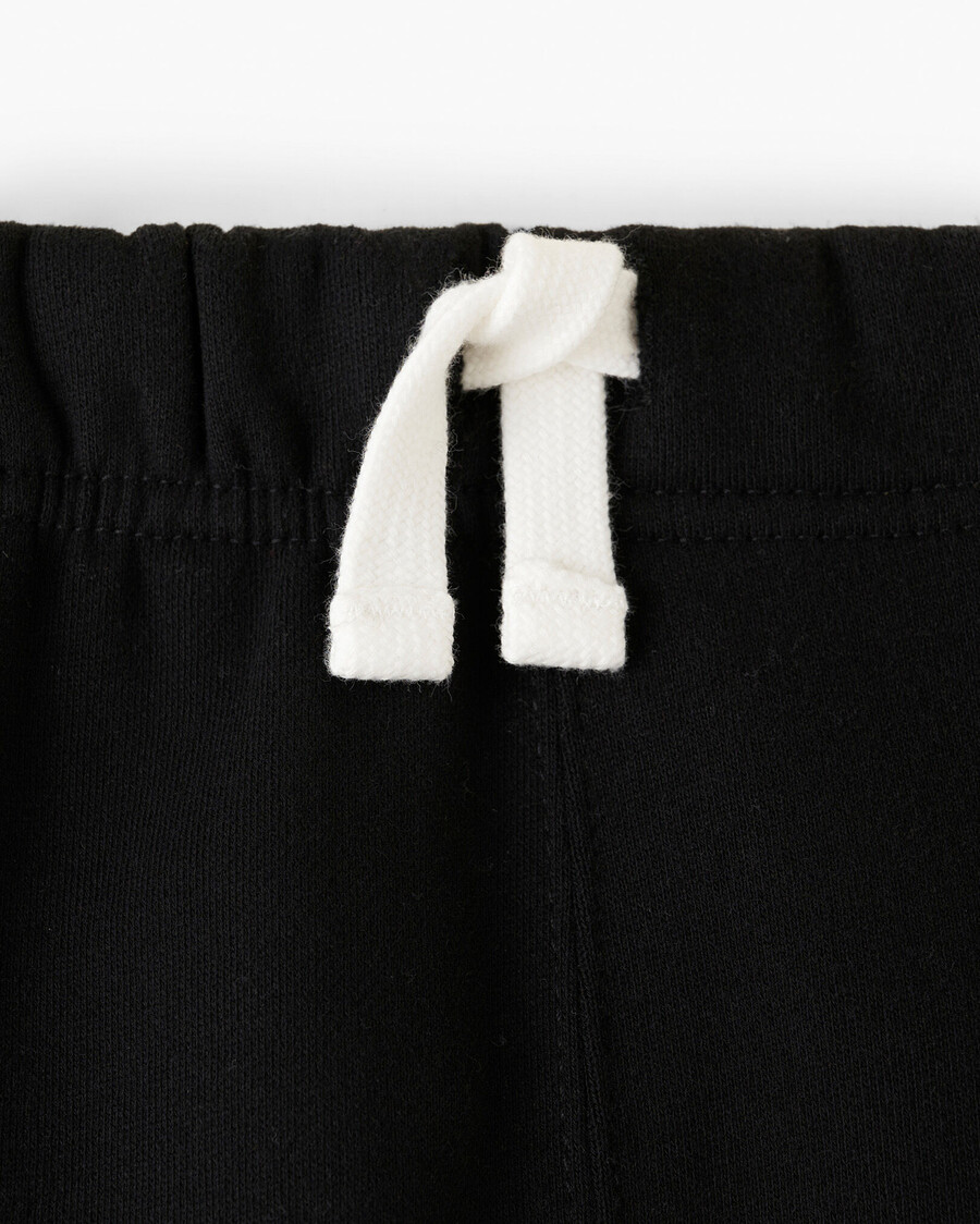 pantalón deportivo orgánico con puños ajustados para niña
