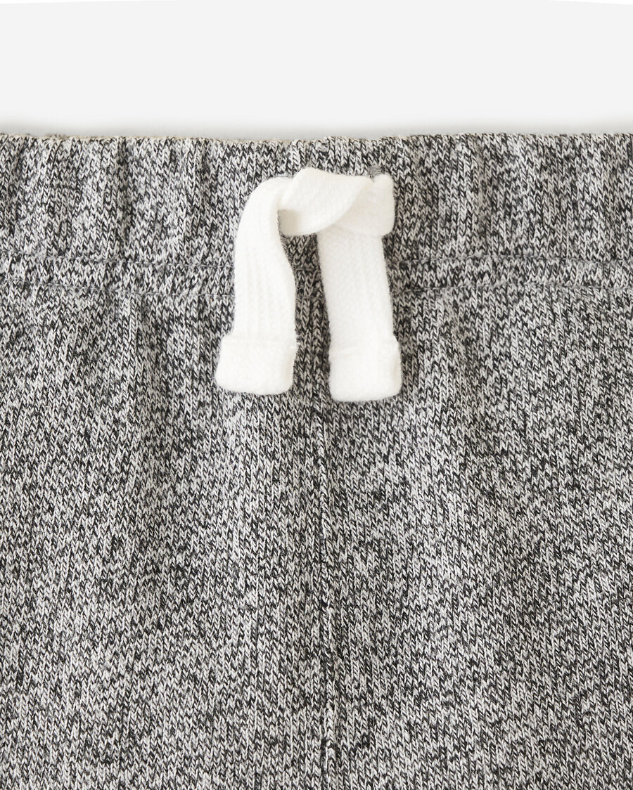 pantalón deportivo orgánico con puños ajustados para niñas pequeñas