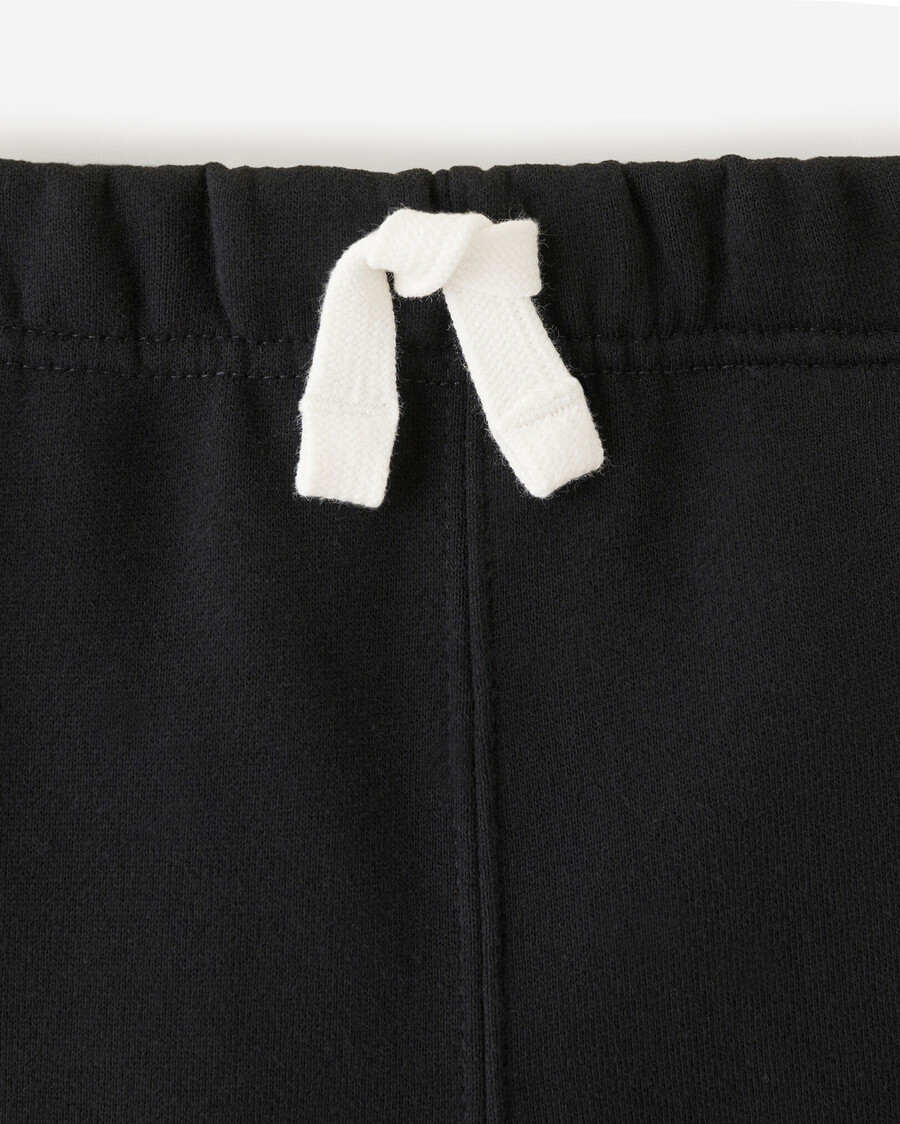 pantalón deportivo orgánico con puños ajustados para niñas pequeñas