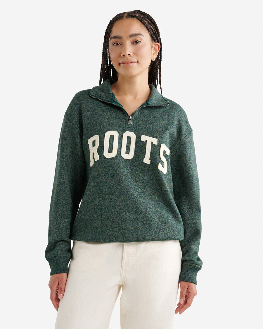 jarra de media cremallera con apliques roots