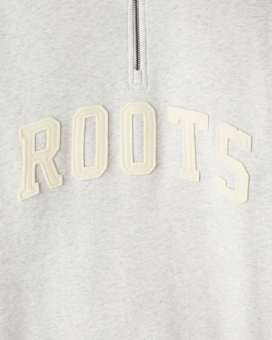 jarra de media cremallera con apliques roots
